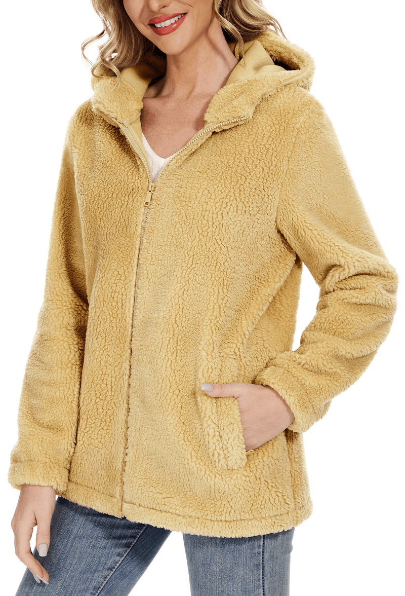 Stylish fluffy women's jacket with hood, zipper, and pockets in beige, perfect for cozy winter fashion SF0905.